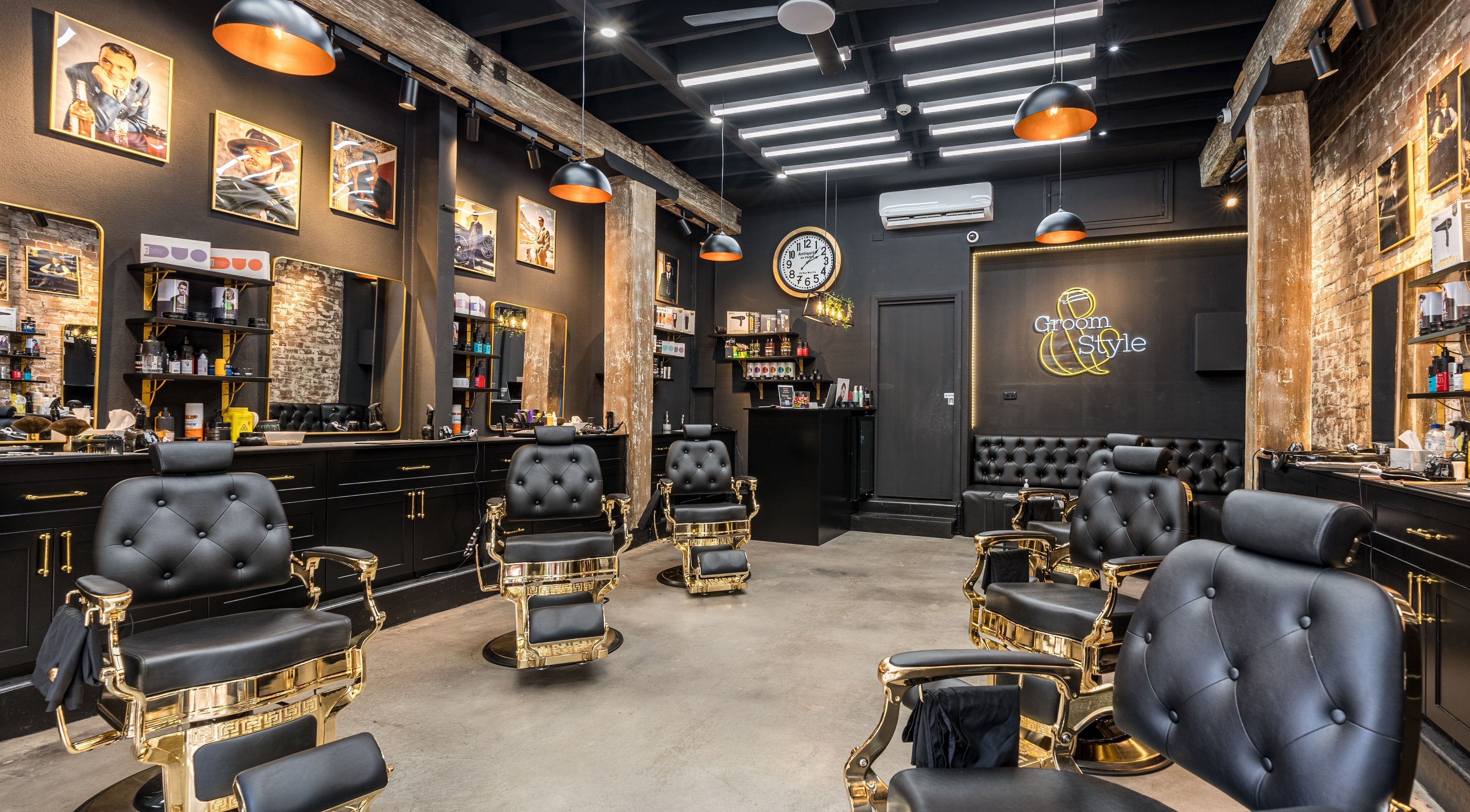 Elegant interior of Groom & Style Barber Shop in Waterloo, New South Wales, AU with luxurious barber chairs.