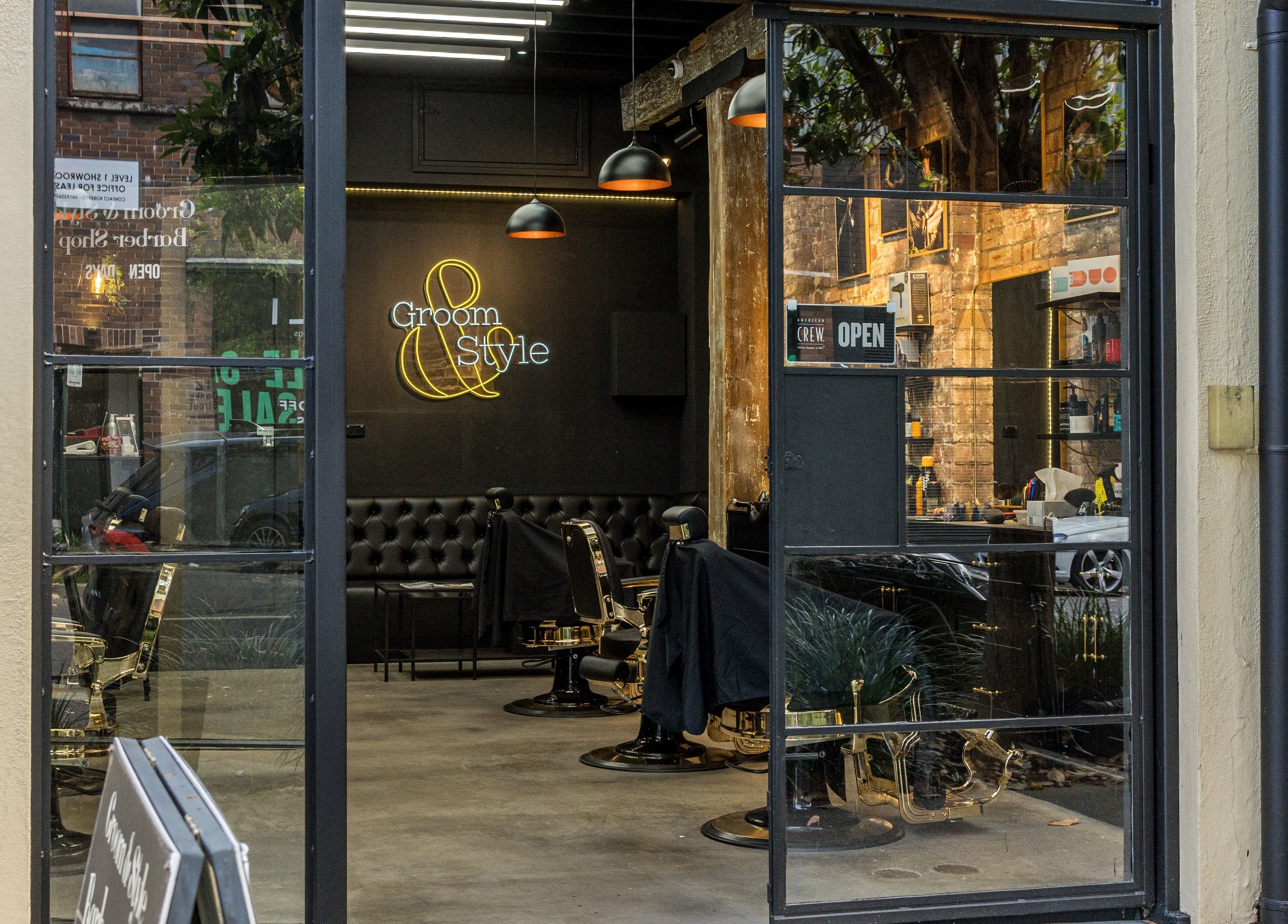 Groom & Style Barber Shop facade in Waterloo, New South Wales, AU showcasing modern stylish decor.