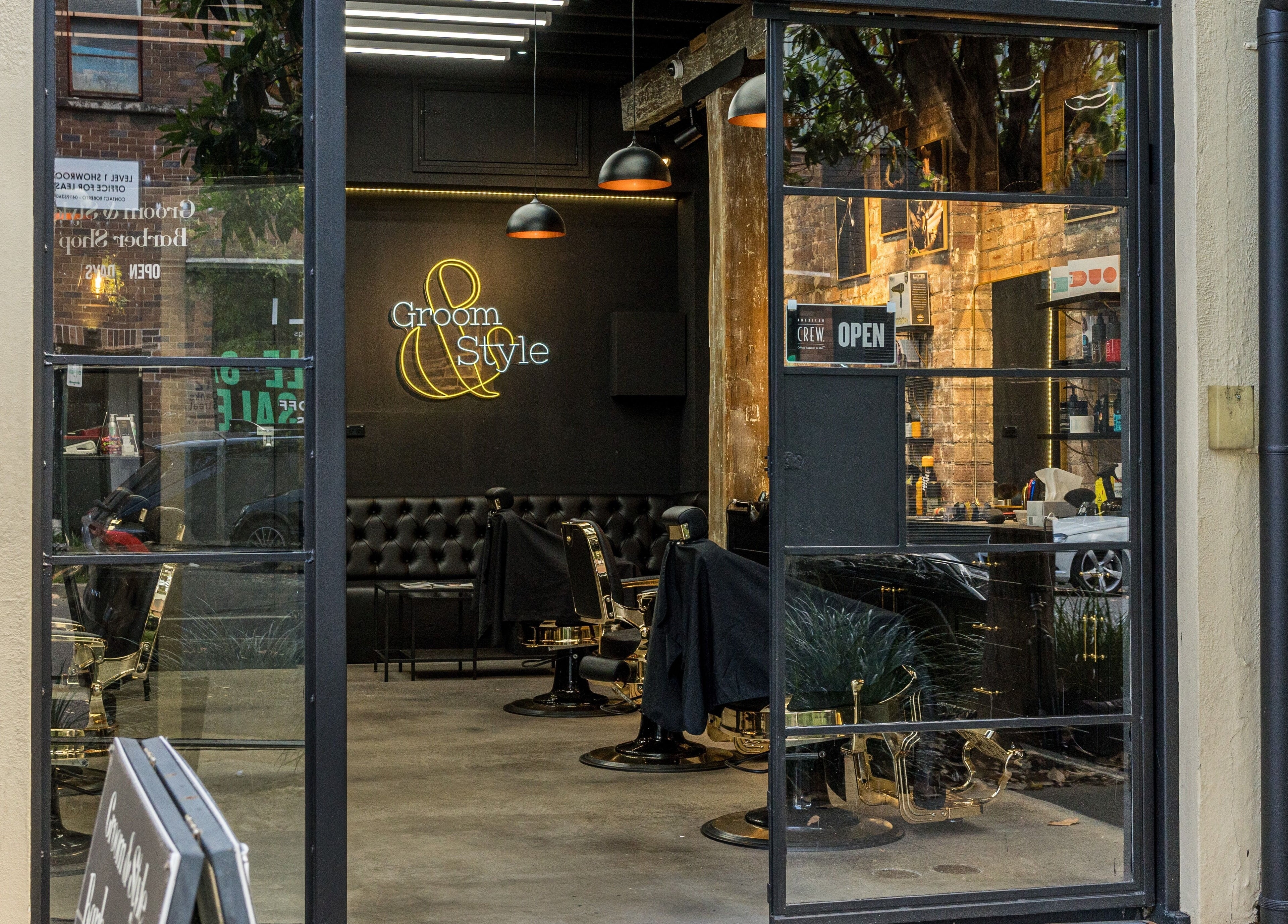 Groom & Style Barber Shop facade in Waterloo, New South Wales, AU showcasing modern stylish decor.