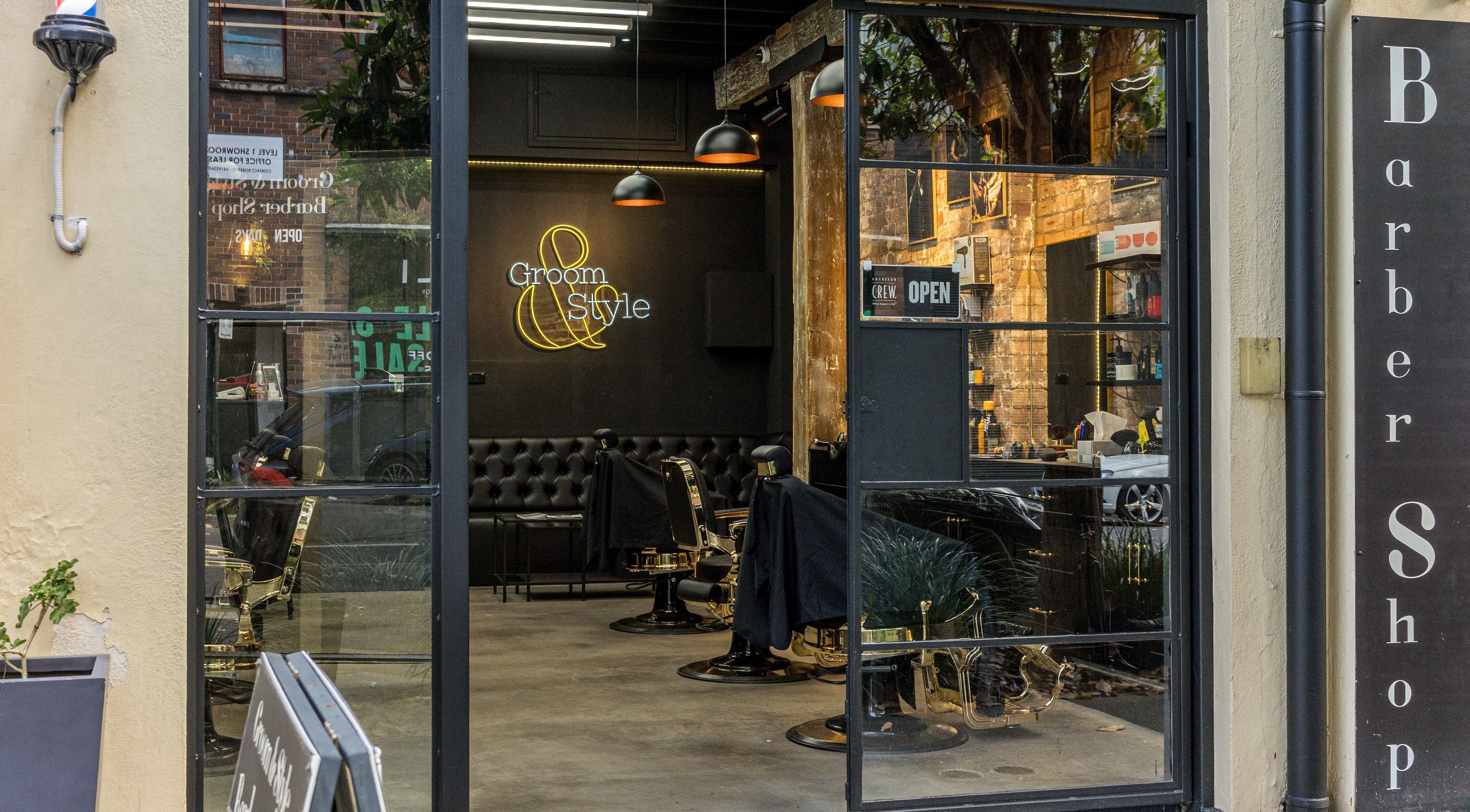 Groom & Style Barber Shop facade in Waterloo, New South Wales, AU showcasing modern stylish decor.