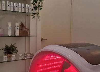 LED therapy room at Radiant Skin & Body By Jo, Pie Creek, Queensland, AU, highlighting skincare products and decor.