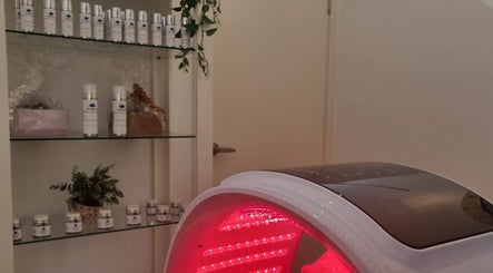 LED therapy room at Radiant Skin & Body By Jo, Pie Creek, Queensland, AU, highlighting skincare products and decor.