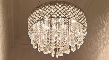 Elegant crystal chandelier at Flourish Eco Hair, Subiaco, Western Australia, AU.
