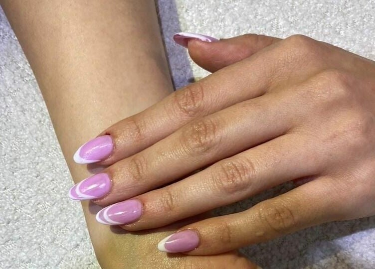 Elegant pink and white nails at Maya Beauty Salon, Dubai, Dubai, AE.