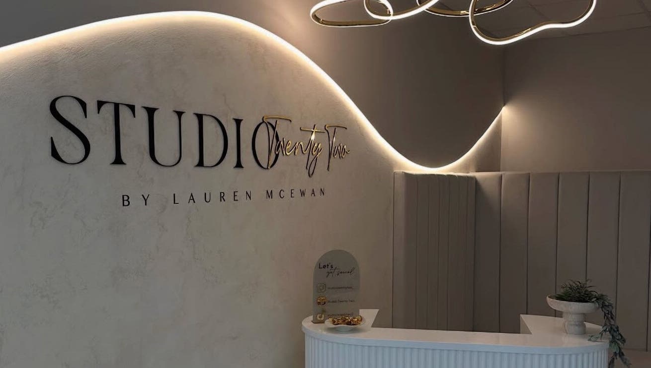 Stylish interior of Iona McLauchlan Hairdressing's lobby in Stirling, Scotland, GB, featuring modern design.