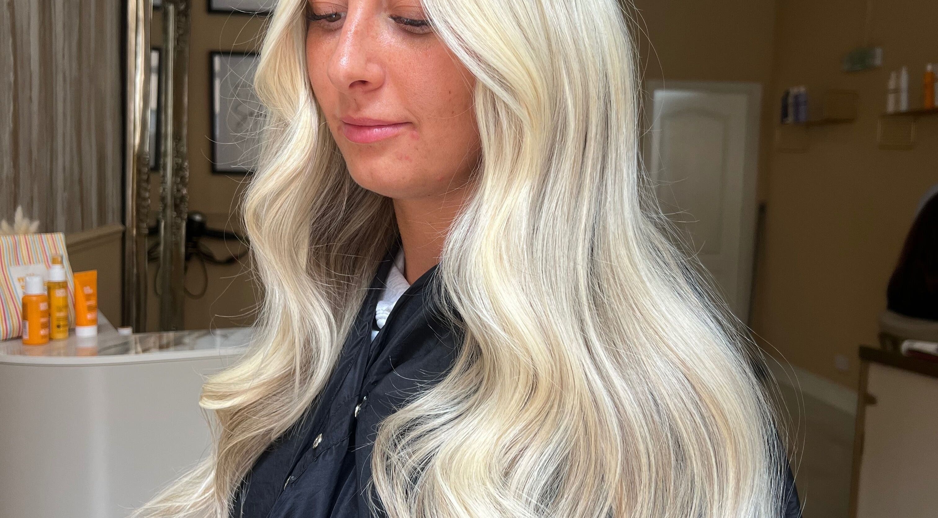 Elegant blonde curls styled at Iona McLauchlan Hairdressing in Stirling, Scotland, GB.