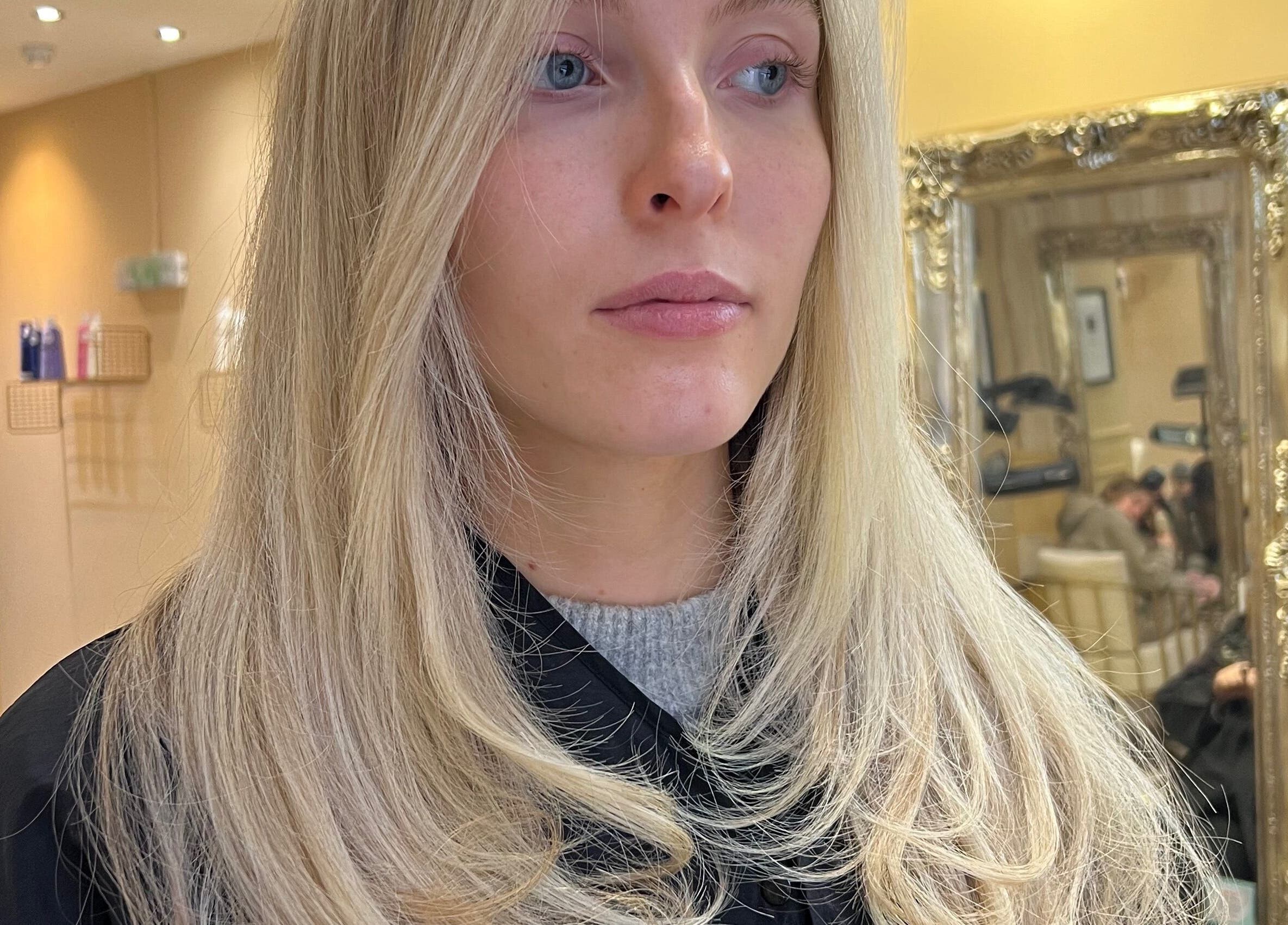 Stylish blonde hairstyle showcased at Iona McLauchlan Hairdressing in Stirling, Scotland, GB.