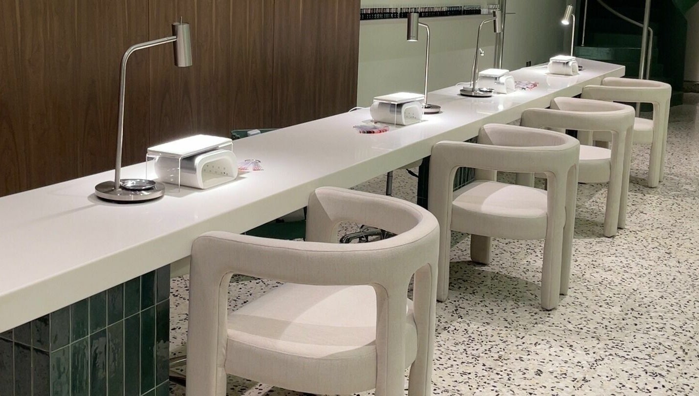 Modern nail station at Tend Salon | تند صالون, Riyadh, Riyadh Province, SA, featuring sleek design and plush chairs.