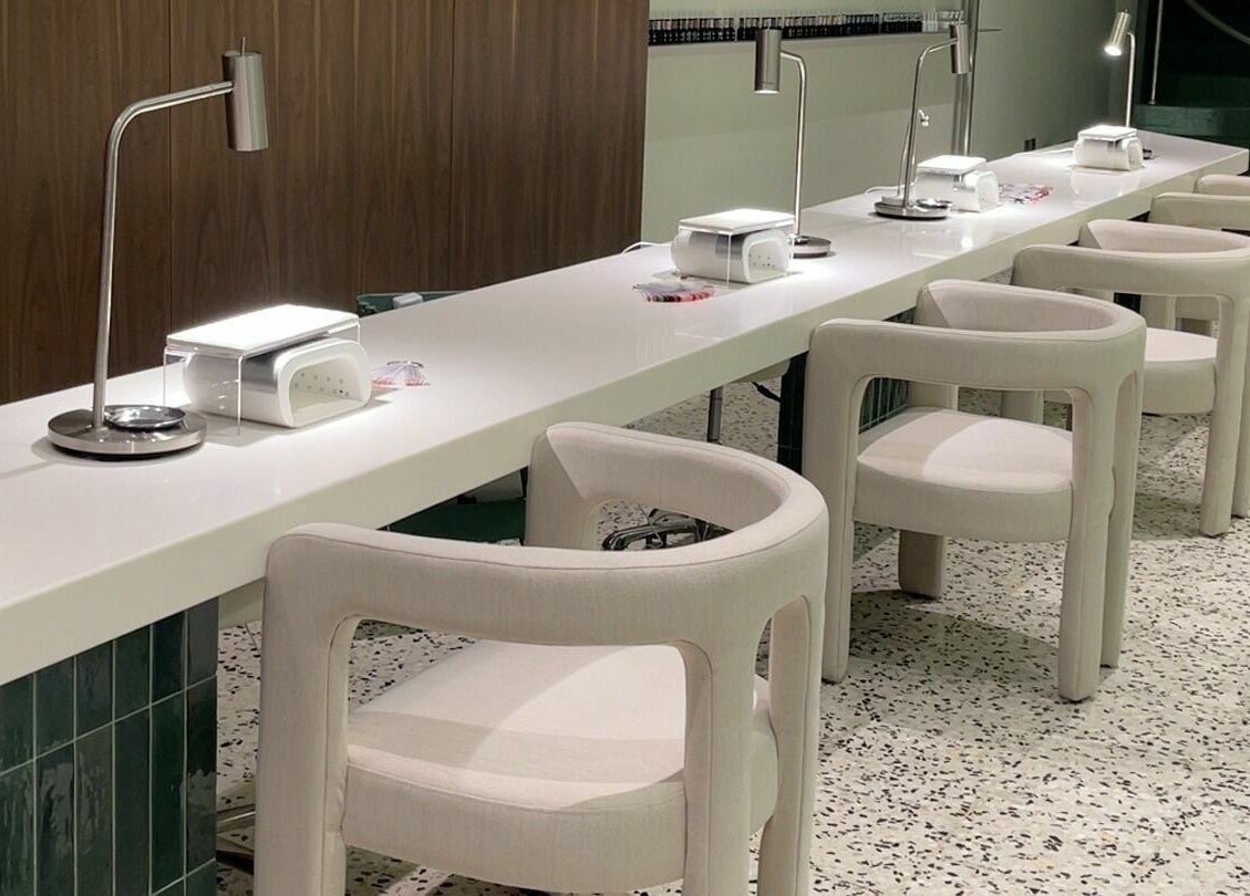 Modern nail station at Tend Salon | تند صالون, Riyadh, Riyadh Province, SA, featuring sleek design and plush chairs.