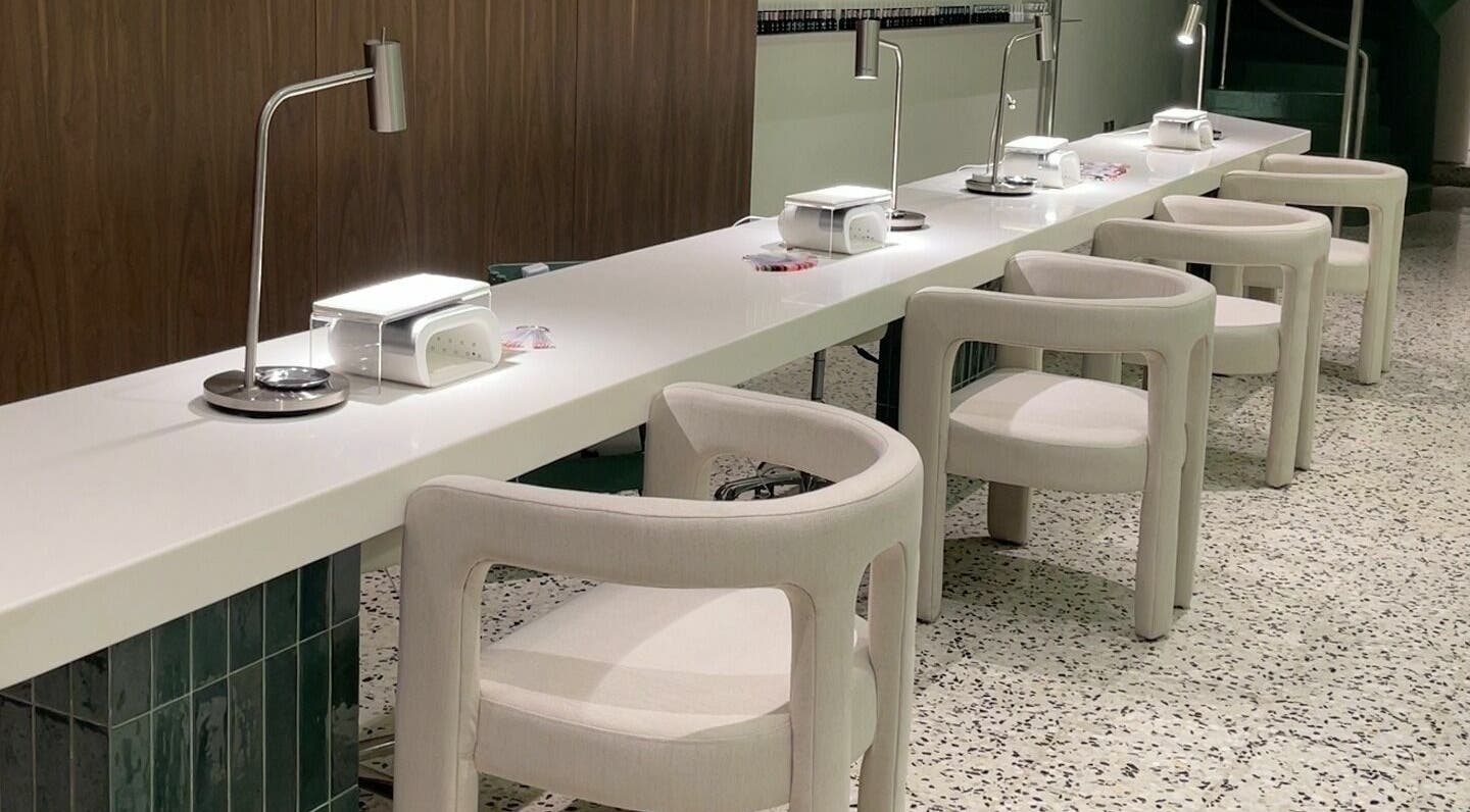 Modern nail station at Tend Salon | تند صالون, Riyadh, Riyadh Province, SA, featuring sleek design and plush chairs.