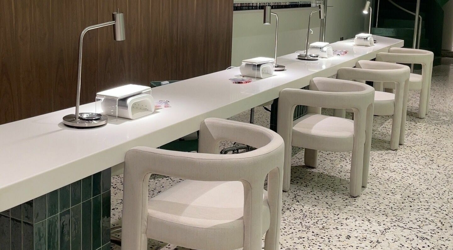 Modern nail station at Tend Salon | تند صالون, Riyadh, Riyadh Province, SA, featuring sleek design and plush chairs.