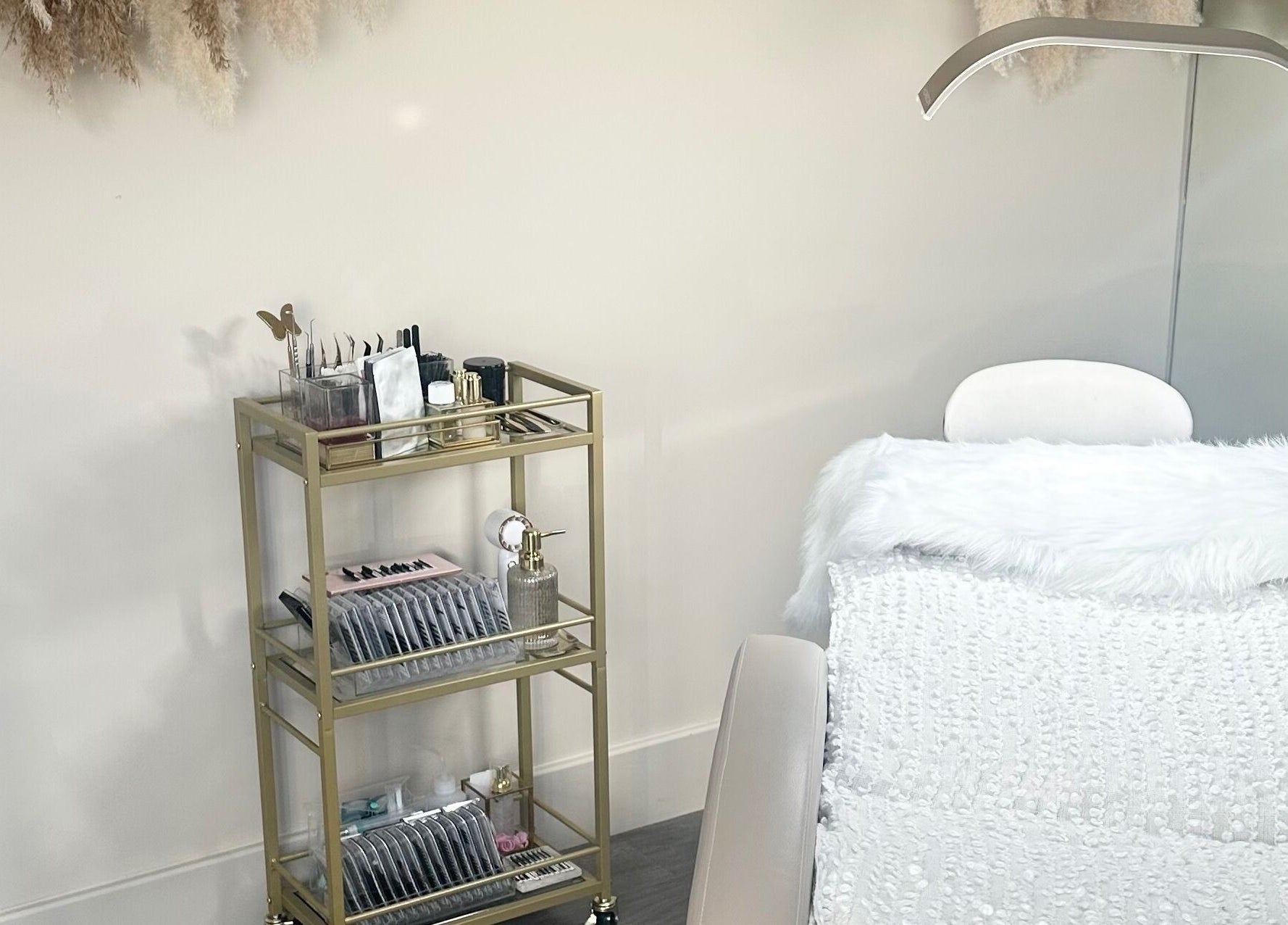 Beauty Box By Zoe in Billingshurst, England features a serene treatment area with chic decor.