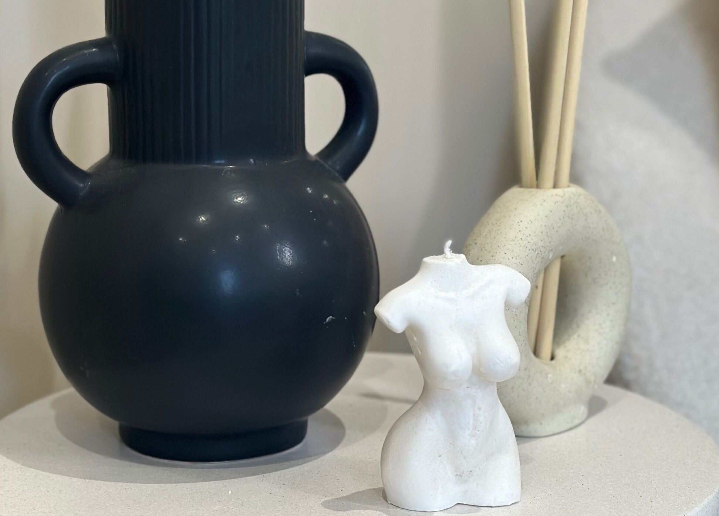 Elegant decor at Beauty Box By Zoe, Billingshurst, England, GB featuring a black vase and white sculpture.