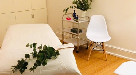 Serene therapy room at Faith’s Store and Therapy Rooms, Hereford, England, GB, with massage bed and eucalyptus.