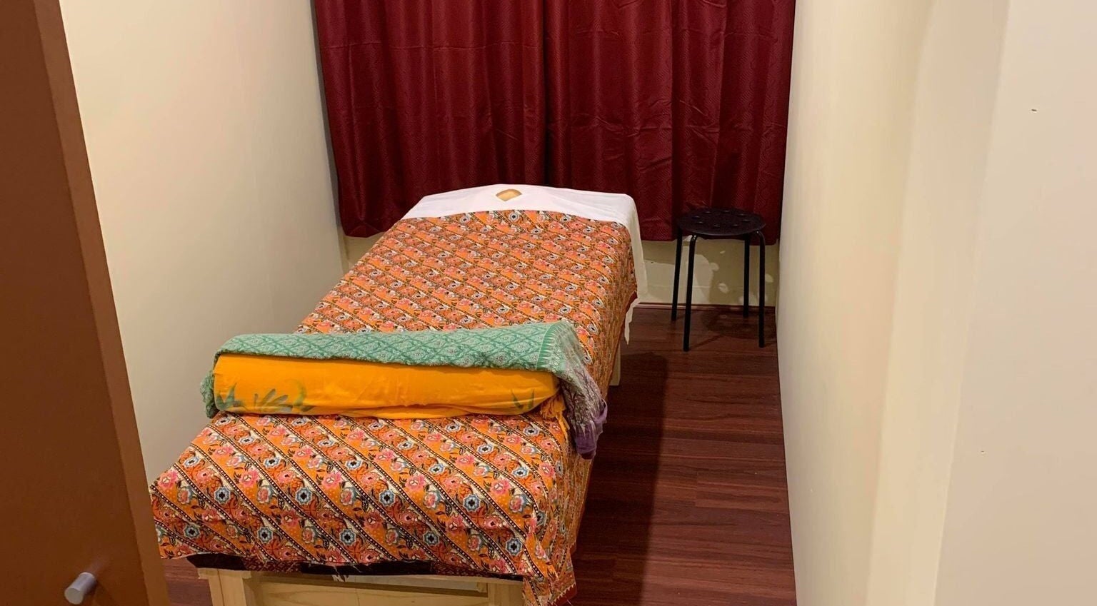 Relaxing massage room at Nattha's Thai Pty Ltd, Fremantle, Western Australia, AU with vibrant decor.