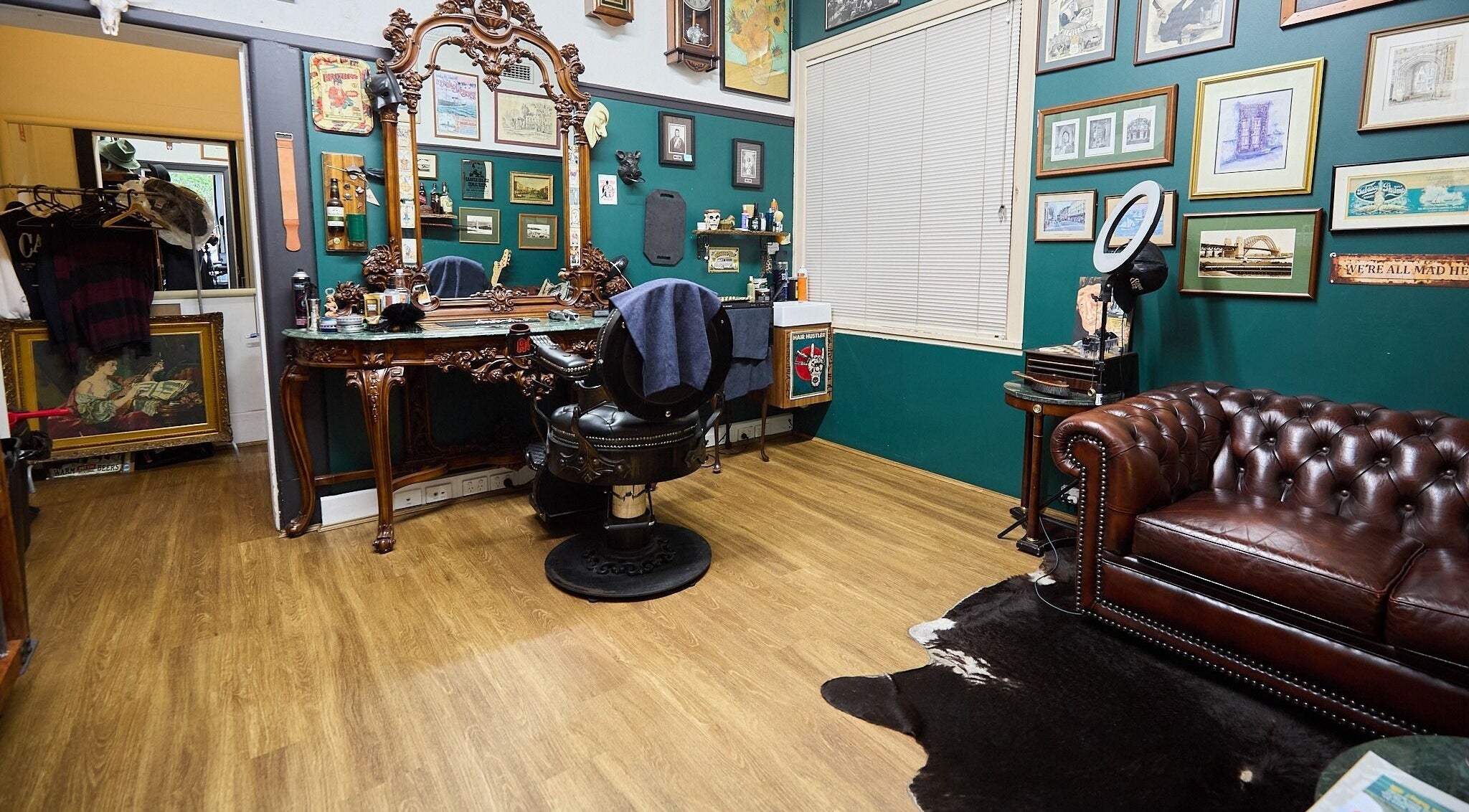 Elegant barber chair in vintage decor at The Hanged Man Tattoo & Barber, Manly, New South Wales, AU.