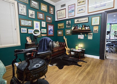 Chic interior of The Hanged Man Tattoo & Barber in Manly, New South Wales, AU with vintage decor.