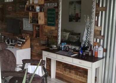 Rustic barber chair and products at Barber James in East London, Eastern Cape, ZA showcase classic style.