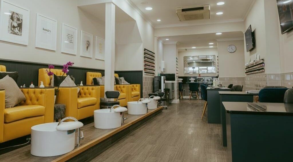 Luxurious chairs and nail stations at Nail Spa, London, England, GB with stylish decor and serene ambiance.