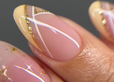 Stylish gold accented nails at dayanailscuracao, Willemstad, Curaçao, CW showcasing intricate nail art.