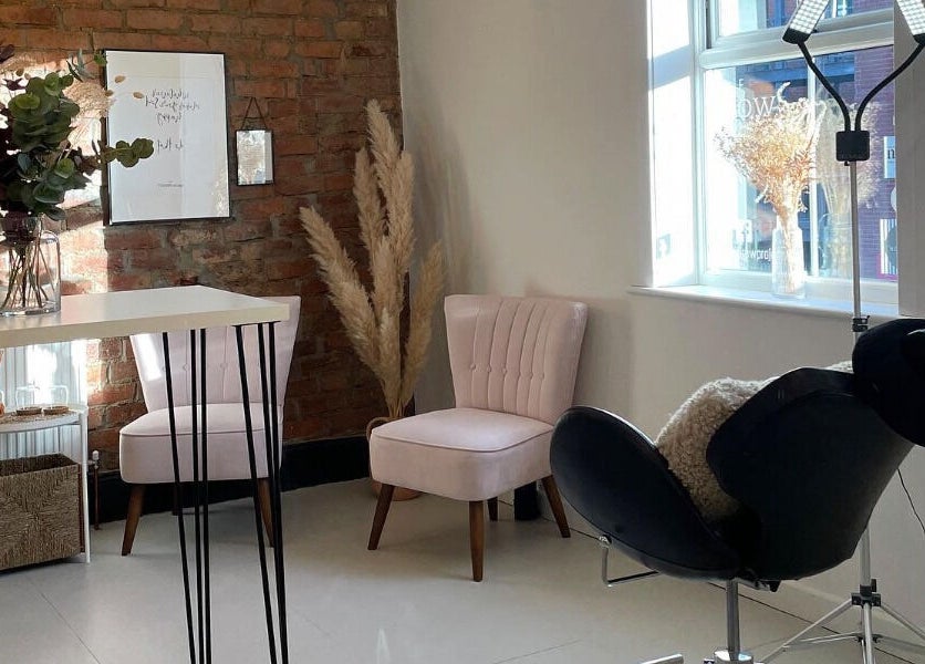 Elegant seating area at The Brow Project in Sheffield, England, GB with stylish decor and soft lighting.