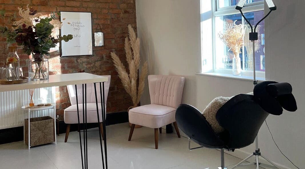 Elegant seating area at The Brow Project in Sheffield, England, GB with stylish decor and soft lighting.