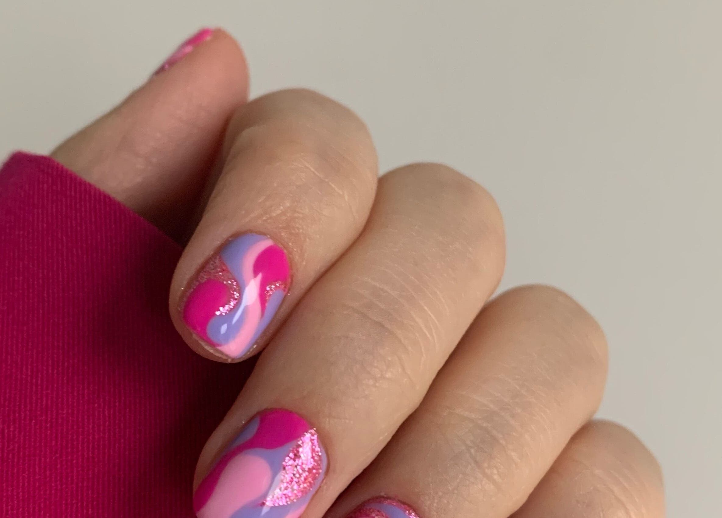 Elegant pink and purple nail art at Beauty by Roxanne, Fleetwood, England, GB.