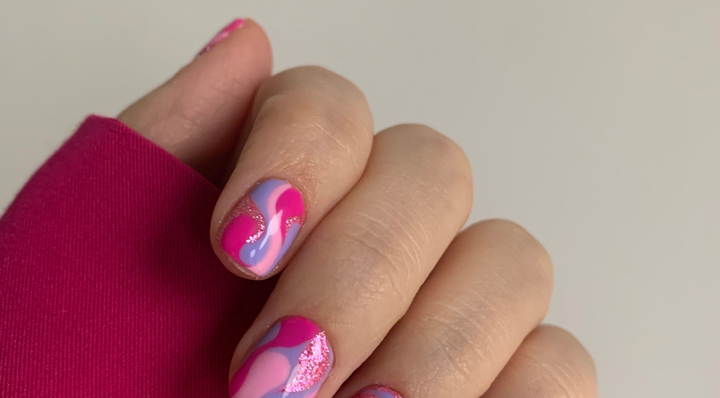 Elegant pink and purple nail art at Beauty by Roxanne, Fleetwood, England, GB.
