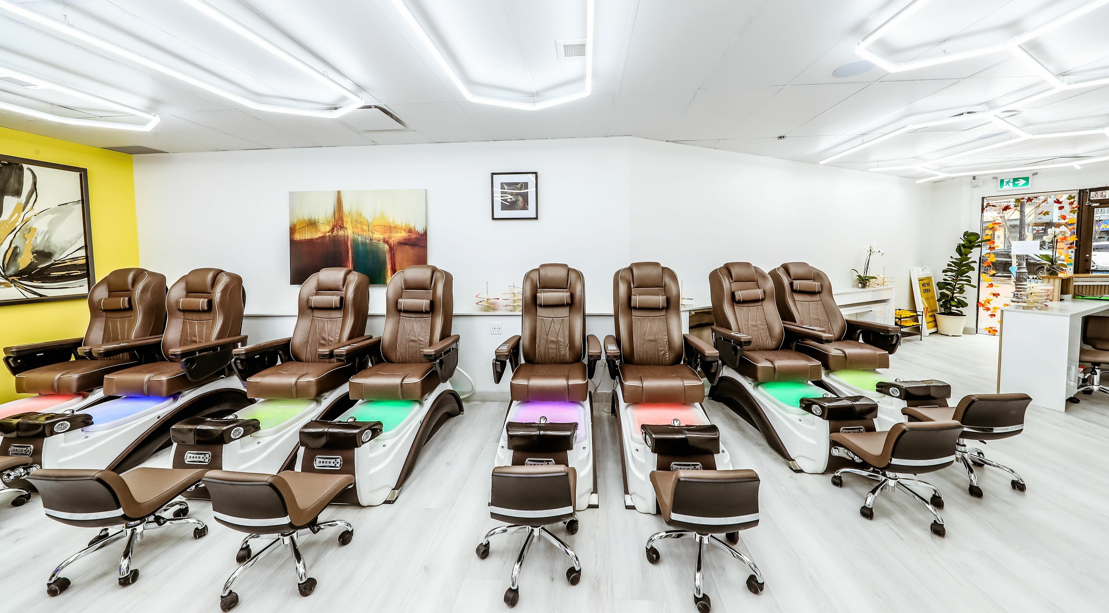 Luxurious pedicure chairs at A Nail Story, Calgary, Alberta, CA, offering a serene spa experience.
