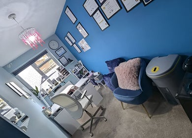 Inviting therapy room at Trulyou, Swindon, England, GB with blue walls and elegant decor.