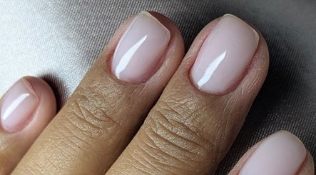 Close-up of manicured nails with a glossy finish at Trulyou, Swindon, England, GB.
