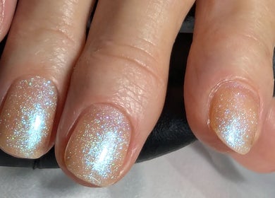 Shimmering gel nails with glitter at Trulyou, Swindon, England, GB.