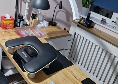 Trulyou beauty workstation in Swindon, England, GB showcasing a stylish nail setup and lamp.