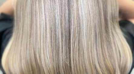 Beautifully styled blonde hair with highlights at Hair by Claudia in Warrington, England, GB.