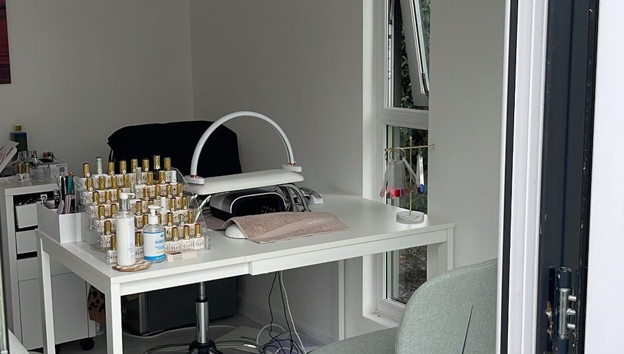 Manicure station with nail polishes at Maddie's Beauty Room, Great Baddow, England, GB.