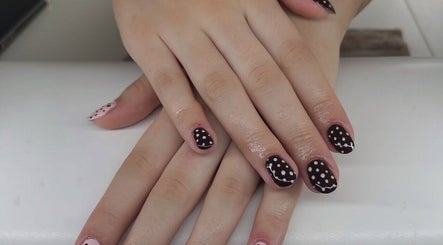 Elegant polka dot nail art at Maddie's Beauty Room, Great Baddow, England, GB.
