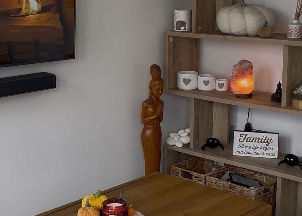 Cozy decor in Maddie's Beauty Room, Great Baddow, England, GB, featuring wooden statue and salt lamp.