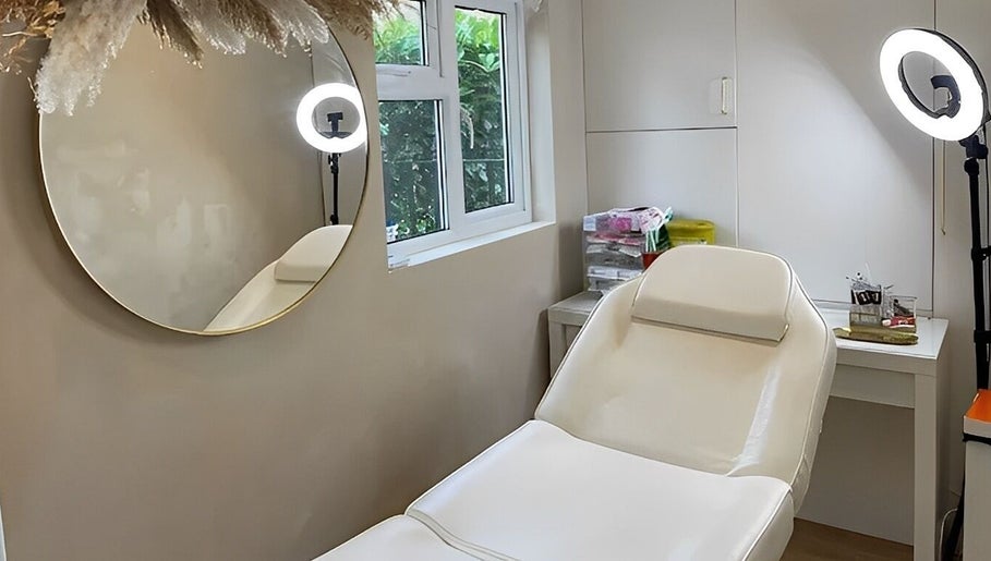 Relaxing treatment room at Abbigail Richards Hair, Makeup & Aesthetics in Reading, England, GB, featuring a comfortable chair.