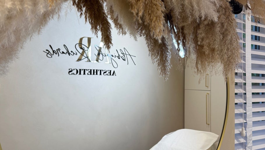 Elegant interior at Abbigail Richards Hair, Makeup & Aesthetics in Reading, England, GB with pampas grass decor.