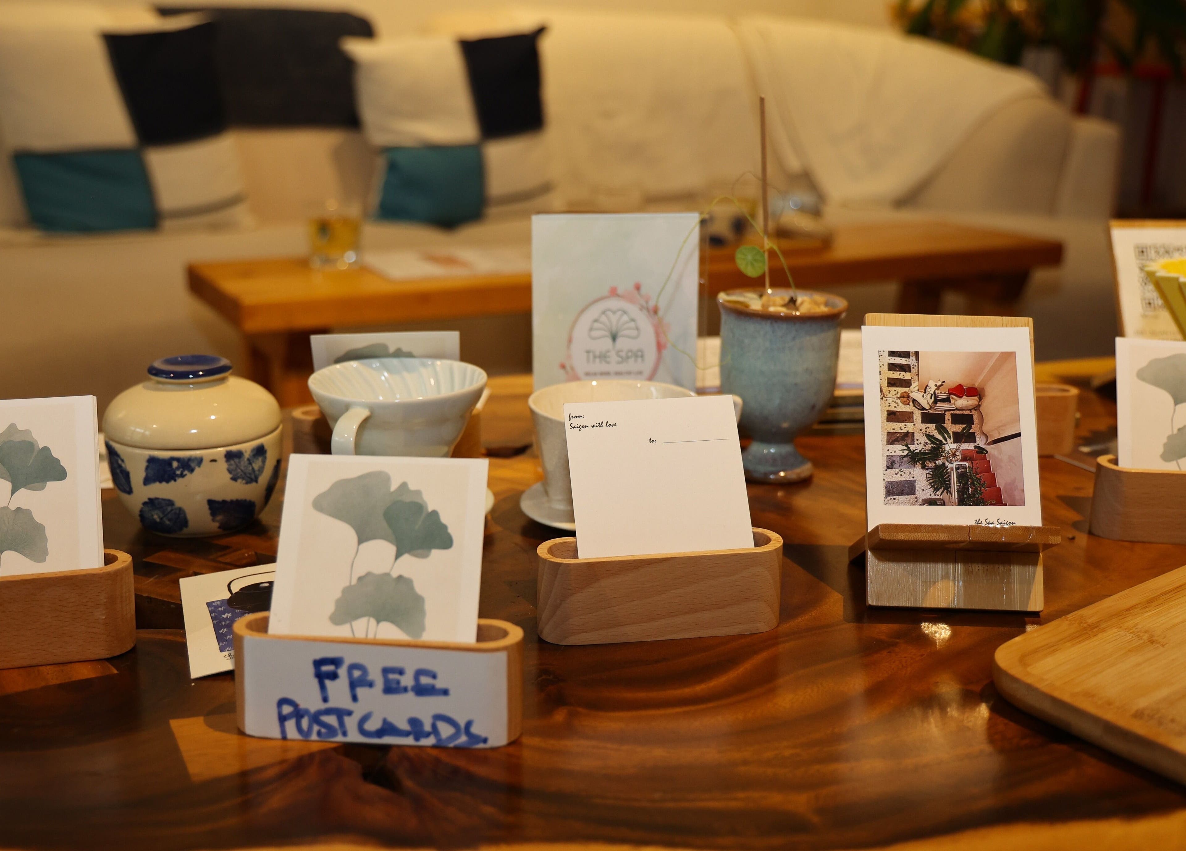 Elegant postcards and pottery at The Spa Saigon, Thành Phố Hồ Chí Minh, VN enhance the relaxing atmosphere.