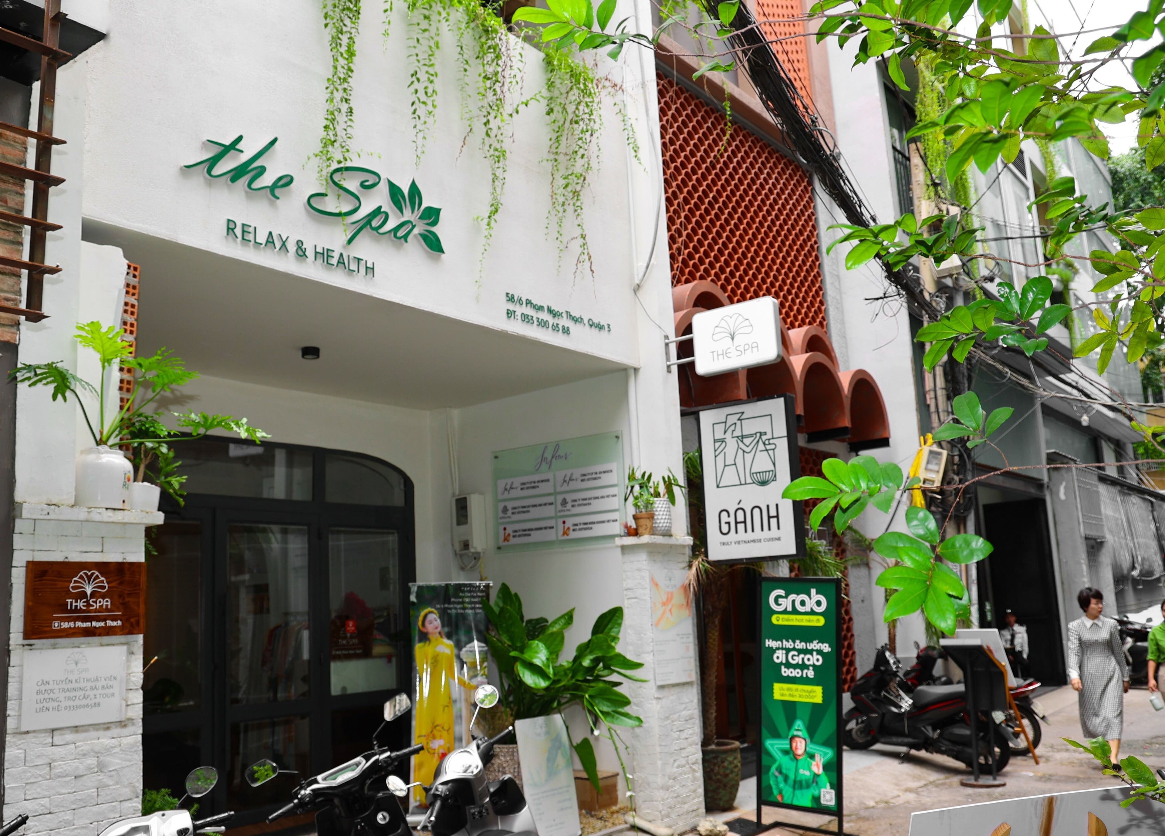 Entrance of The Spa&Aodai in Hồ Chí Minh, Hồ Chí Minh, VN, surrounded by lush greenery.