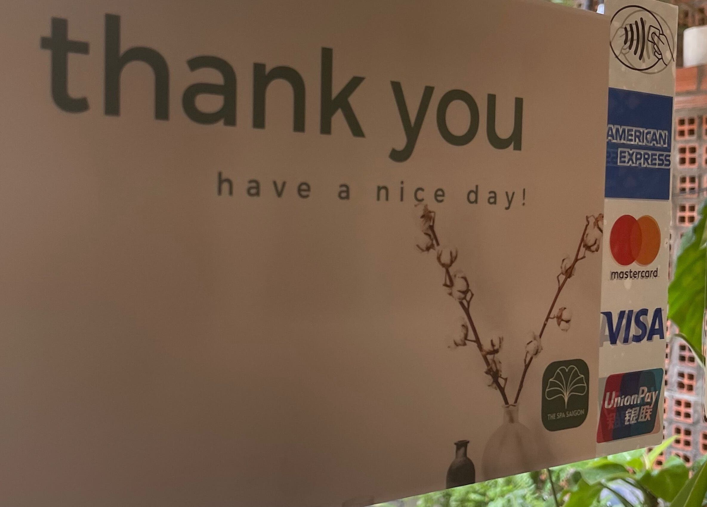 Thank you sign with payment options at The Spa&Aodai, Hồ Chí Minh, VN; a warm farewell to visitors.