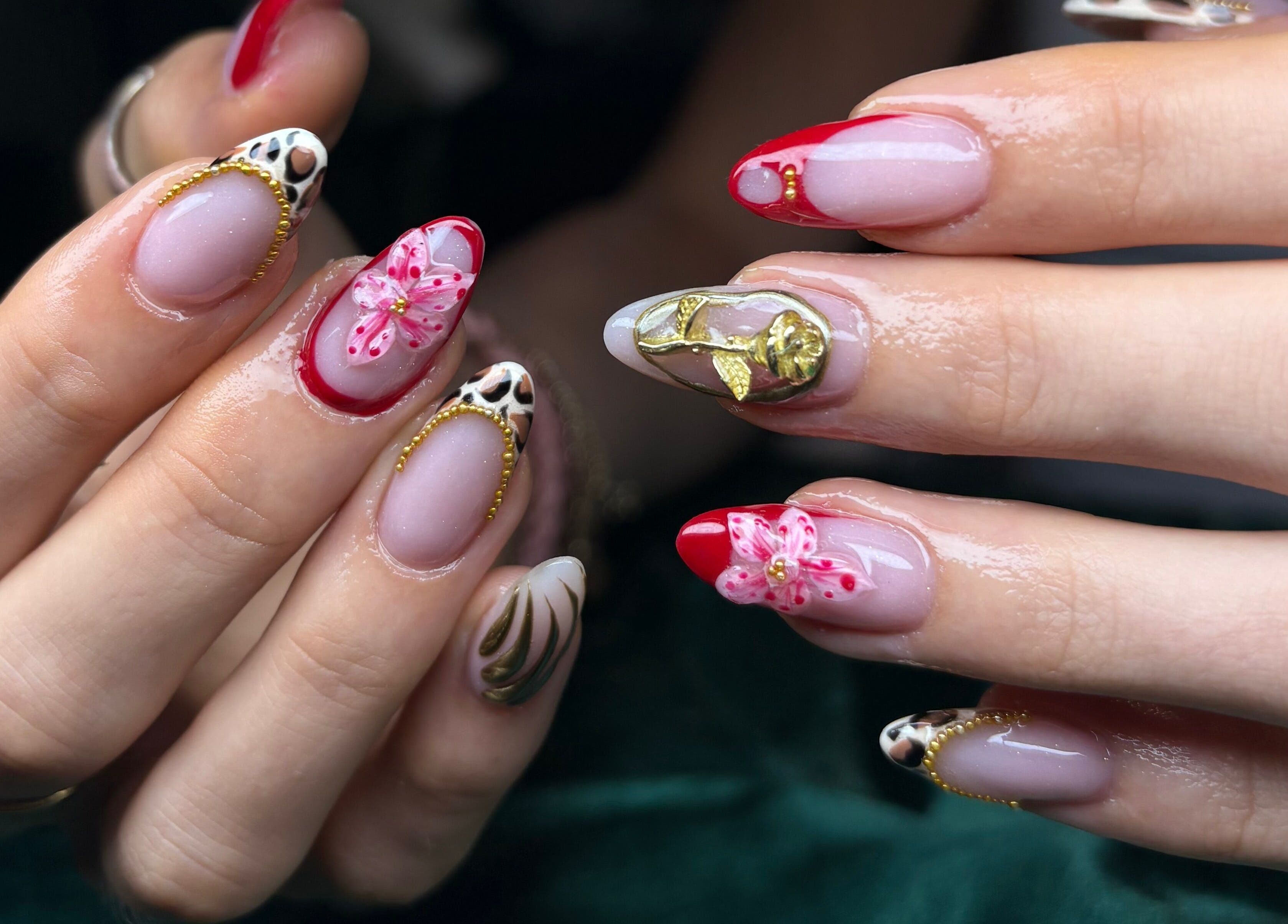 Detailed nail art with floral accents at NSNails+ in Tampa, Florida, US.