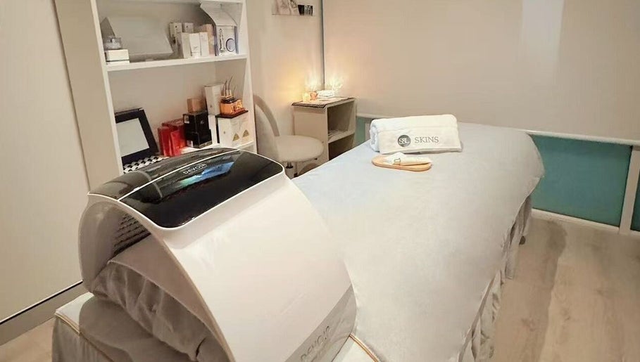 Relaxing treatment room at S&L Skins Beauty in Sydney, New South Wales, AU, showcasing luxury skincare setup.