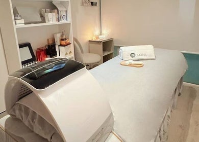 Relaxing treatment room at S&L Skins Beauty in Sydney, New South Wales, AU, showcasing luxury skincare setup.