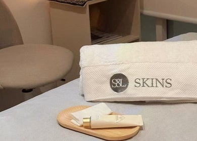 S&L Skins Beauty spa setup with towel and creams, Sydney, New South Wales, AU.