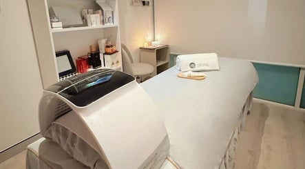 Relaxation room at S&L Skins Beauty in Sydney, New South Wales, AU with cozy treatment bed and ambient lighting.