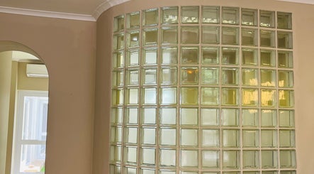 Elegant glass block wall at Liliy Nails Beauty Studio in Cape Town, Western Cape, ZA, enhancing tranquil ambiance.