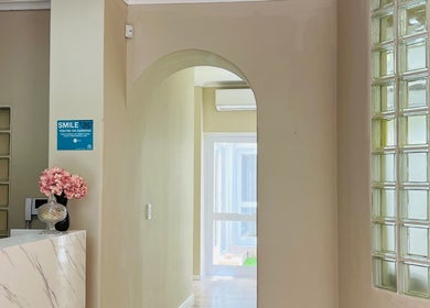 Elegant interior of Liliy Nails Beauty Studio in Cape Town, Western Cape, ZA. Features glass blocks and floral decor.