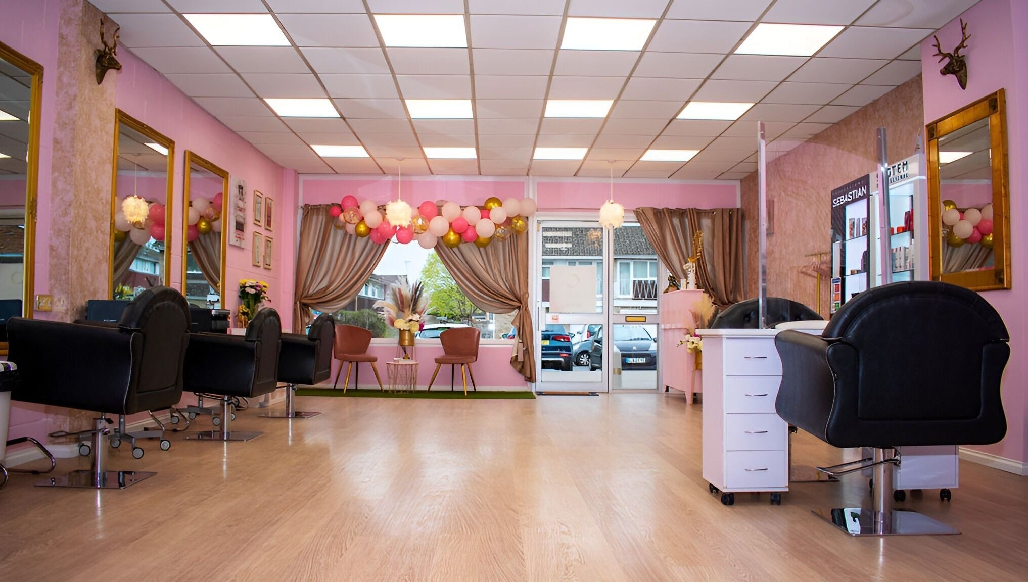 Elegant salon interior at Naturally U, Sittingbourne, England, GB, featuring chic decor and stylish seating.